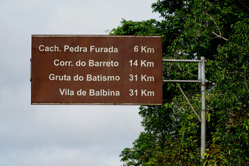 Signposts to various waterfalls in Amazon rainforest. The most beautiful falls in Amazon rainforest are located near highway AM 240 between the communities of Presidente Figueiredo and Balbina, Brazil