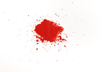Red paint drop on a white background. Blob paint.