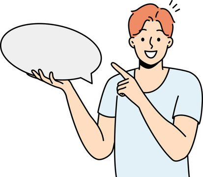 Smiling man point at mockup speech bubble