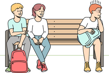 Children bullying boy outdoors