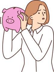 Unhappy woman with piggybank stressed with finances