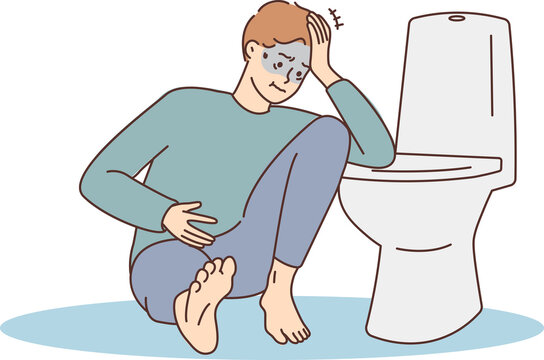 Unhealthy man suffer from intoxication near toilet