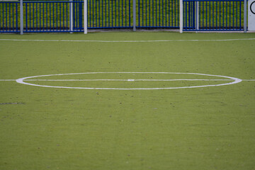 Football field with artificial grass.