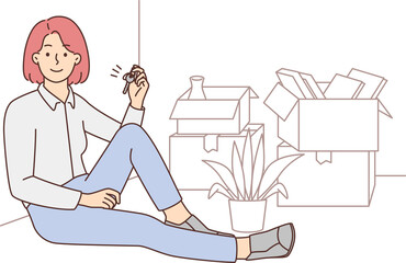 Happy woman holding keys to new home