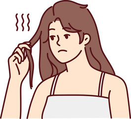 Unhappy woman frustrated with hair loss