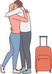 Woman hugging man with suitcase