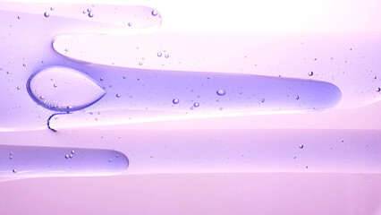 Slowly evolving transparent purple liquid abstract background.