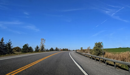 Fototapeta premium Cool, bright Fall morning ont he highway, Upstate NY, USA