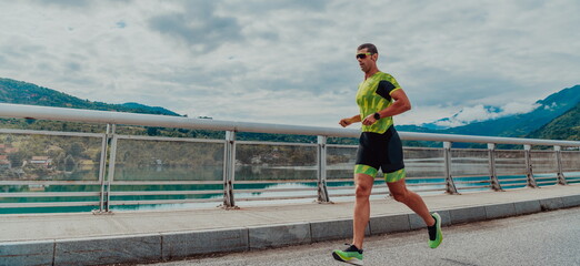 An athlete running a marathon and preparing for his competition. Photo of a marathon runner running...