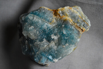 Onyx mineral stone on a grey background