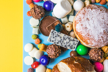 Unhealthy products. food bad for figure, skin, heart and teeth. Assortment of fast carbohydrates food with candy
