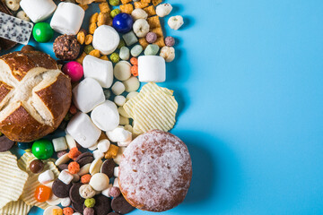 Unhealthy products. food bad for figure, skin, heart and teeth. Assortment of fast carbohydrates food with candy