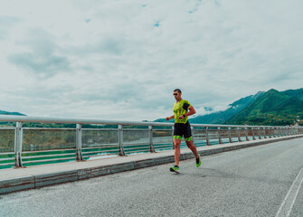 An athlete running a marathon and preparing for his competition. Photo of a marathon runner running...
