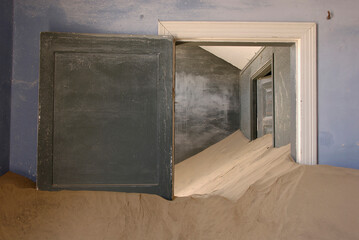 Kolmanskop, NAMIBIA - December (5): Sand fills the long since empty houses and buildings of the diamond town