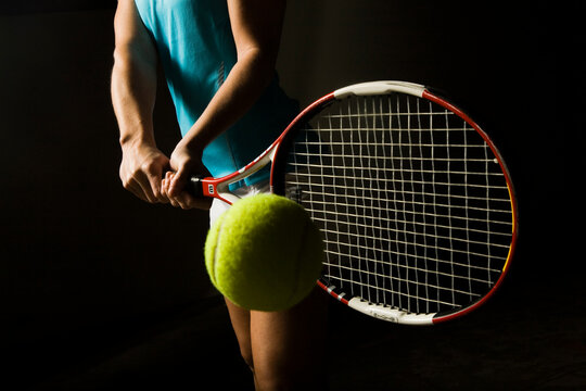 A tennis player poses for action portraits in Carlsbad, CA.