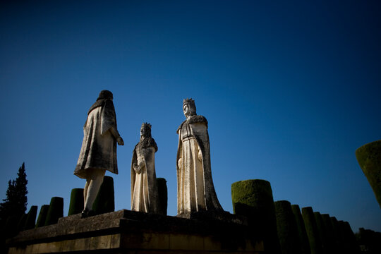 Statues of the Catholic kings and Cristopher Columbus decorate the Alcazar de los Reyes Cristianos, or the Castle of the Christian Kings in Cordoba, Andalusia, Spain.