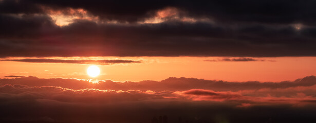Aerial Cloudscape during morning Sunrise Sky. British Columbia, Canada. Nature Background