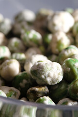 Close up of green peas bean coated with flour