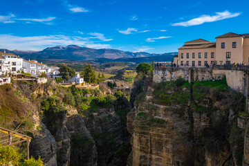 Obraz premium RONDA, SPAIN - DECEMBER 15, 2022: View of famous restaurant on gorges in Ronda, Spain