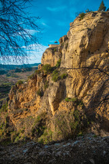 View of buildings on top of gorge in Ronda, Spain