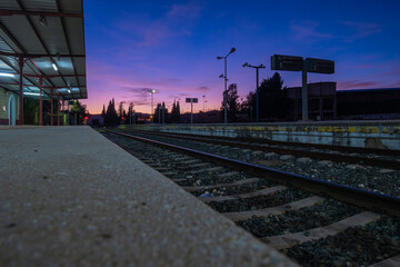 Fototapeta premium View of tracks at the train station in Ronda at night