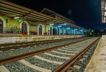 Fototapeta premium View of tracks at the train station in Ronda at night