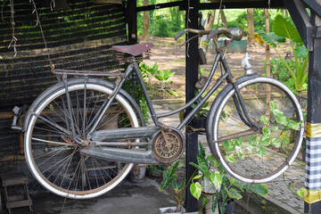 Fototapeta na wymiar Vintage Bicycle on display in front of the house