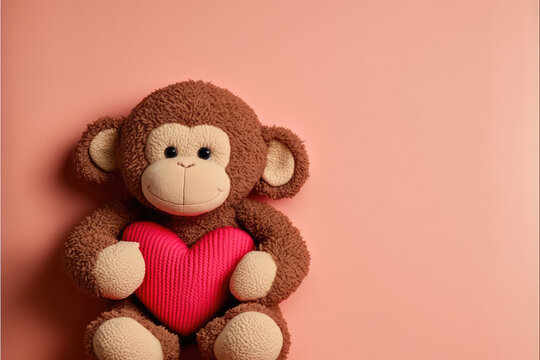Valentine's Day Concept Background Featuring a Cute Stuffed Animal Monkey on a Red background. Perfect for Flat Lay and Top View Photography with Copy Space for Your Text