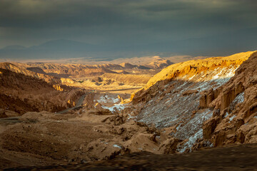 Fototapeta na wymiar Moon Valley dramatic landscape at Sunset, Atacama Desert, Chile