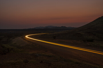 light trails with mountains