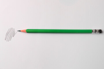 Sharp graphite pencil with eraser and hand drawn scribble on white sheet of paper, top view. Space...