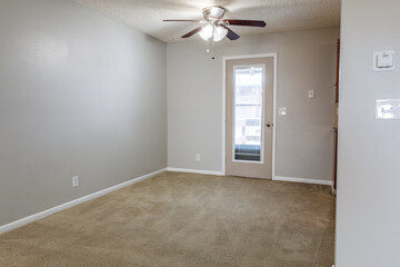 empty room with door and window