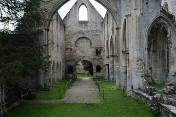 Fototapeta na wymiar View Into The Ruin Of The JumiÃ¨ges Abbey In Normandy France On A Beautiful Sunny Summer Day With A Few Clouds In The Sky