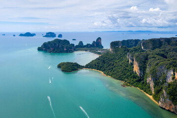 Fototapeta premium Birds eye view of rocky coastline of East Railay Bay on sunny day. Krabi Province, Thailand.
