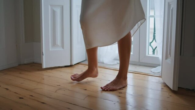 Barefoot Girl Feet Moving Cozy Apartment Close Up. Unrecognizable Woman Dancing