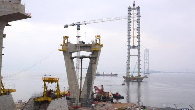 Istanbul Osman Gazi Bosphorus Bridge construction and view of sea cranes