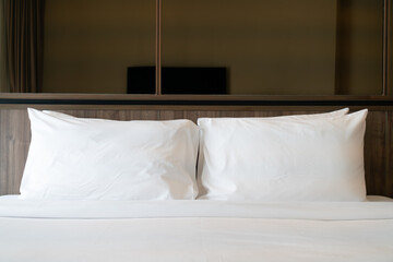 white pillows on bed decoration in bedroom