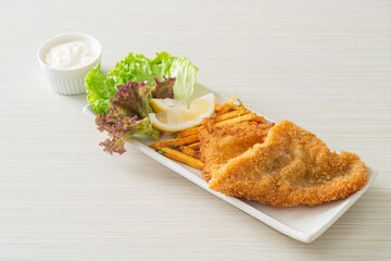 fish and chips - fried fish fillet with potatoes chips