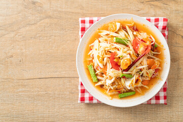 Som Tum - Thai Spicy green papaya salad with salty eggs