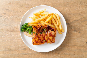 grilled chicken steak with potato chips or french fries