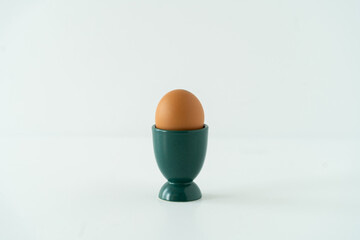 egg in a cup. Clean Eggs Preparing for Easter.
