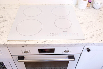 induction white cooker used in the kitchen