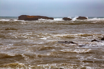 View of the volcanic shore of the Atlantic Ocean in the area of Essaouira in Morocco.