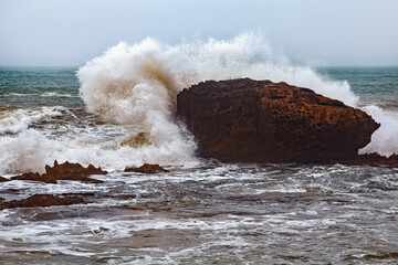 View of the gigantic rocky stone in the Atlantic Ocean in the area of Essaouira in Morocco.
