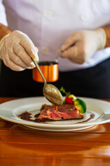 Beef steak and human hands,Be sure to have them ready in the restaurant. 