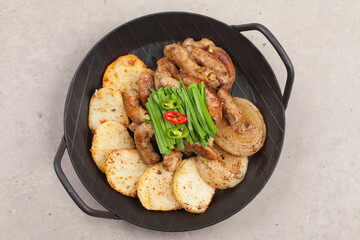 Finely chopped small intestine seasoned and grilled.