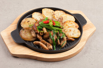 Finely chopped small intestine seasoned and grilled.