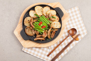 Finely chopped small intestine seasoned and grilled.