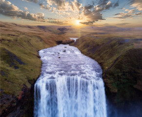 Incredible landscape with Skogafoss waterfall and unreal sunset sky. Iceland, Europe