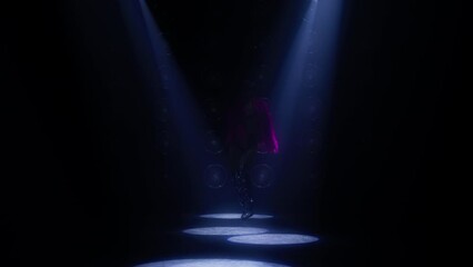 Blue spotlights sliding by floor in dark room with sexy female stripper dancing to camera sensual erotic dance showing back, fit legs and shaped booty. Seduction, private room of strip club concept 4K